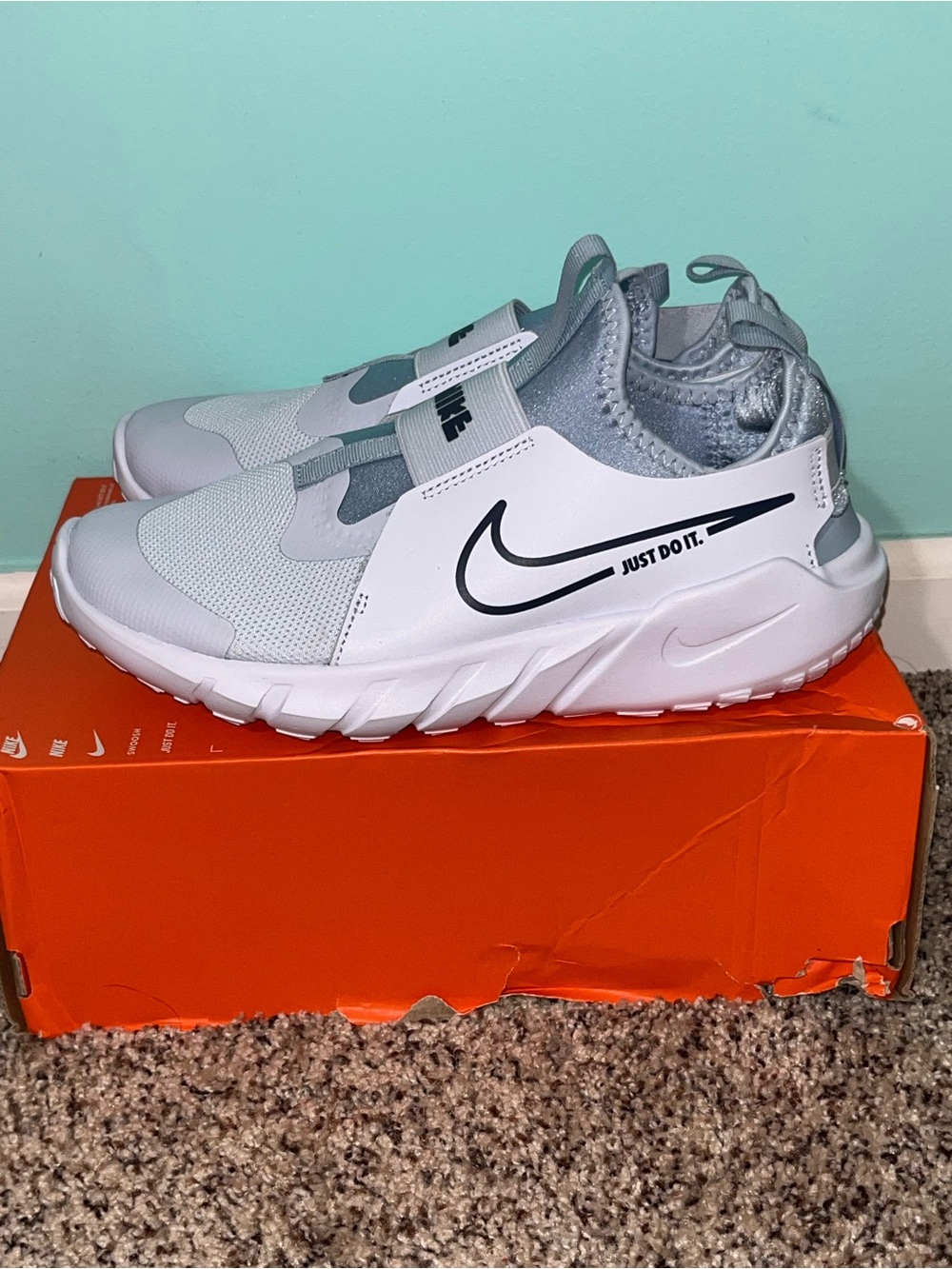 Nike Kids White and Light Gray Slip-On Sneakers with Black Swoosh